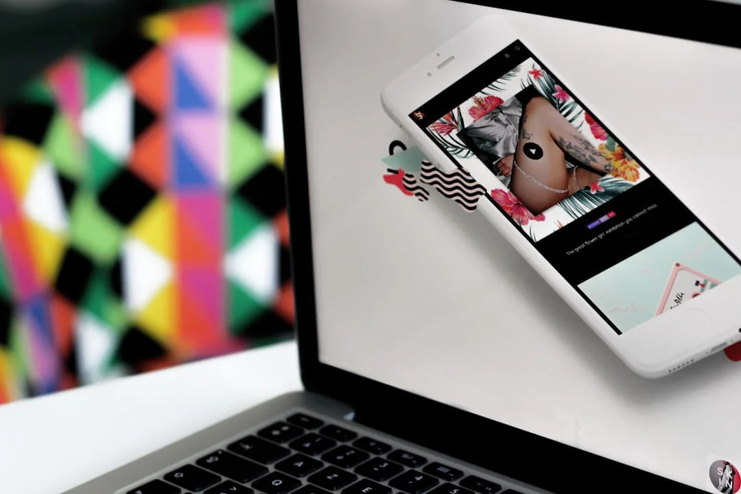 A contemporary workspace showcasing a laptop, tablet, and smartphones, ideal for tech and freelance use.